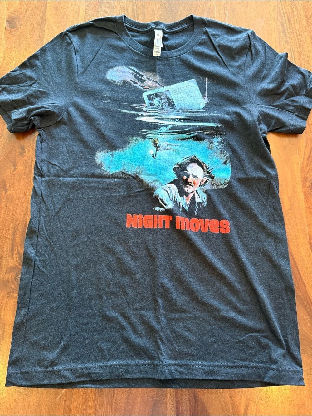 Vintage Black 'Night Moves' Graphic Tee with Teal and Red Print